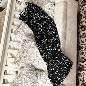 Black dress with white polka-dot sleeveless. Size 12.